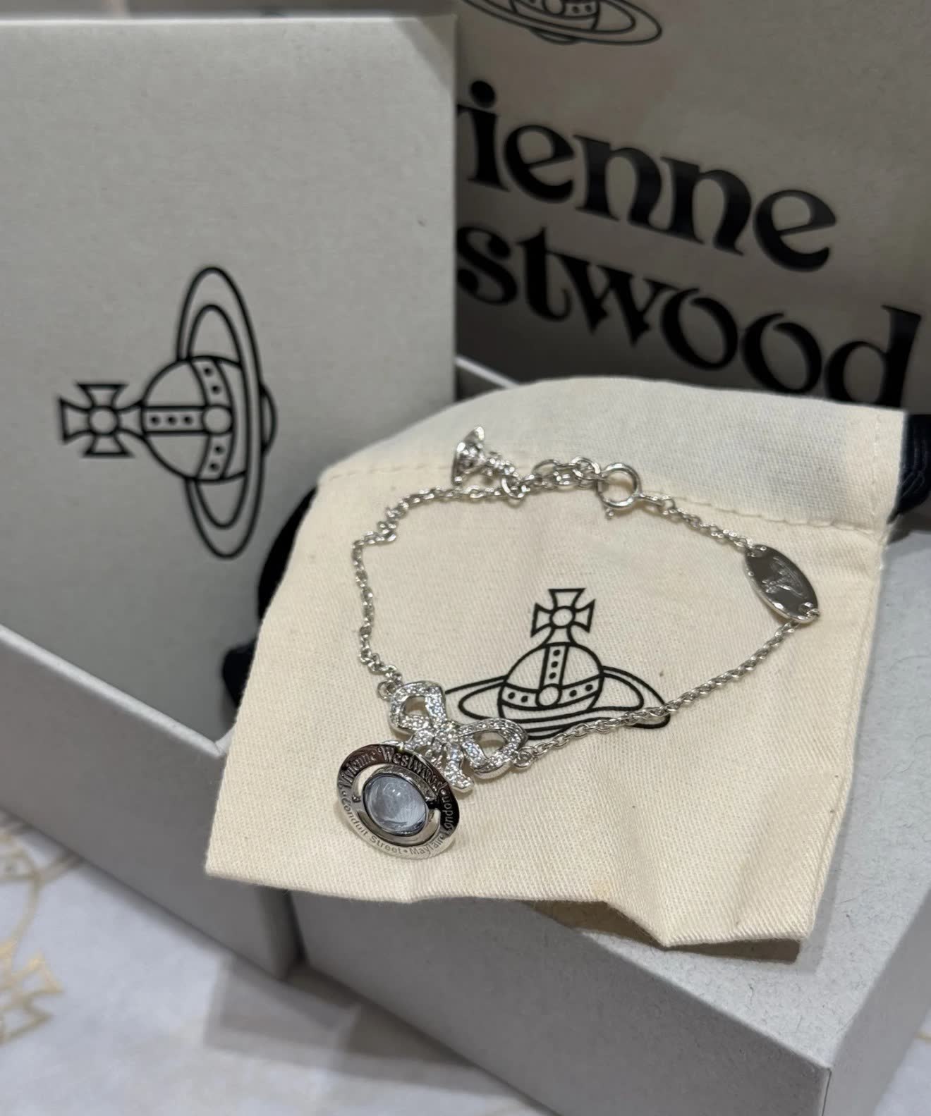 Vivienne Westwood Silver Bracelet with Blue Stone and Bow